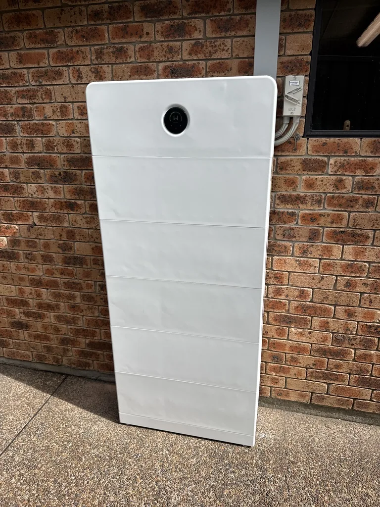 White battery system mounted on a wall