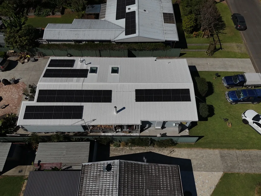 Large residential roof fitted with solar panels